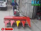 Giá máy gặt lúa xếp dãy an giang.webp